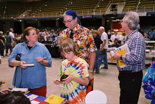 Patch Adams mingles with Rolling Thunder attendees on the Civic Center floor